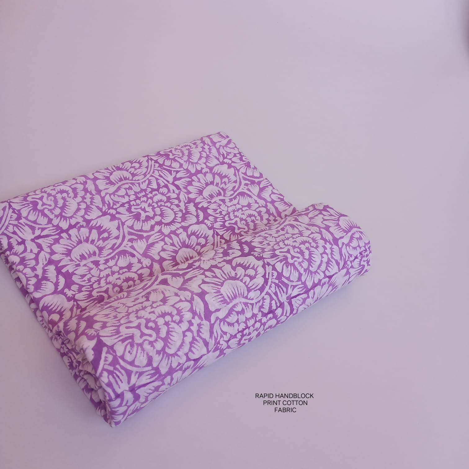 Jaipur Sanganeri handblock printed cotton fabric wholesale in white purple floral design