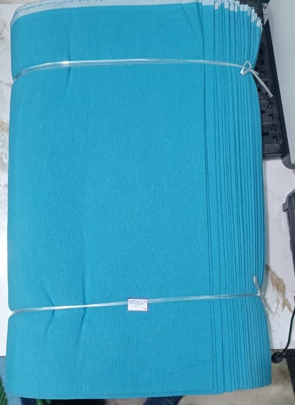 Blue plain khadi fabric in pure cotton, machine-woven for bulk orders at Fabtexs