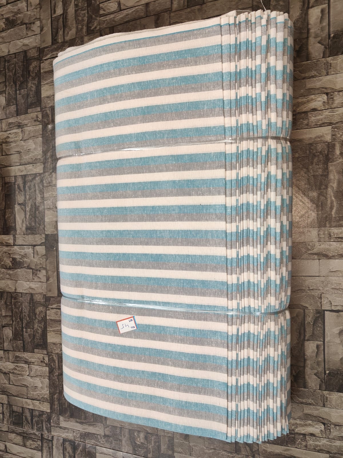 Grey, blue, and white striped khadi fabric in pure cotton, machine-woven for bulk buyers and boutiques
