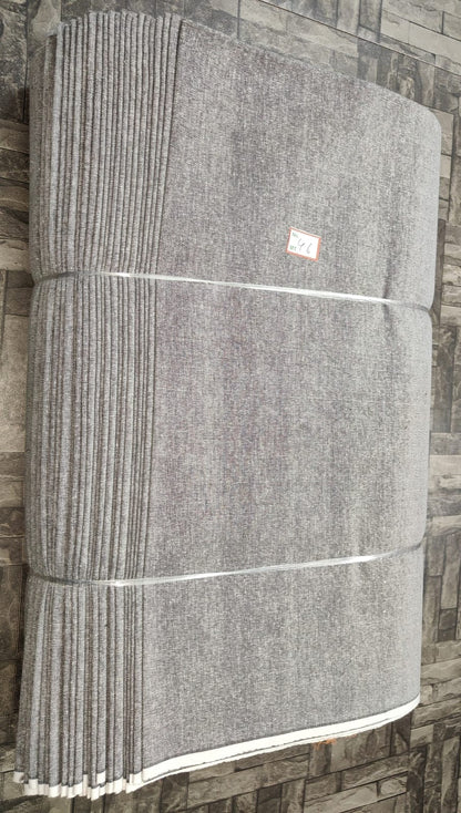 Light grey plain khadi cotton fabric, machine-woven for B2B garment production