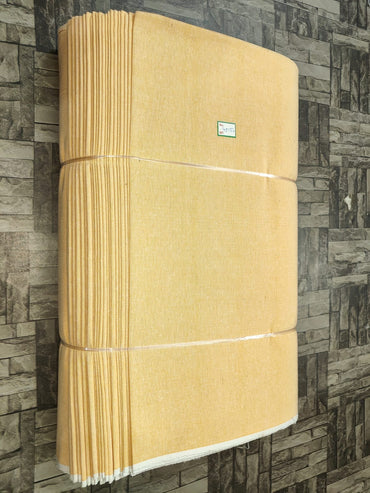 Yellow plain khadi fabric in pure cotton, machine-woven for bulk buyers and boutiques
