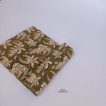 Olive-toned floral Bagru handblock printed fabric on pure cotton, slow-made and ideal for designer apparel.