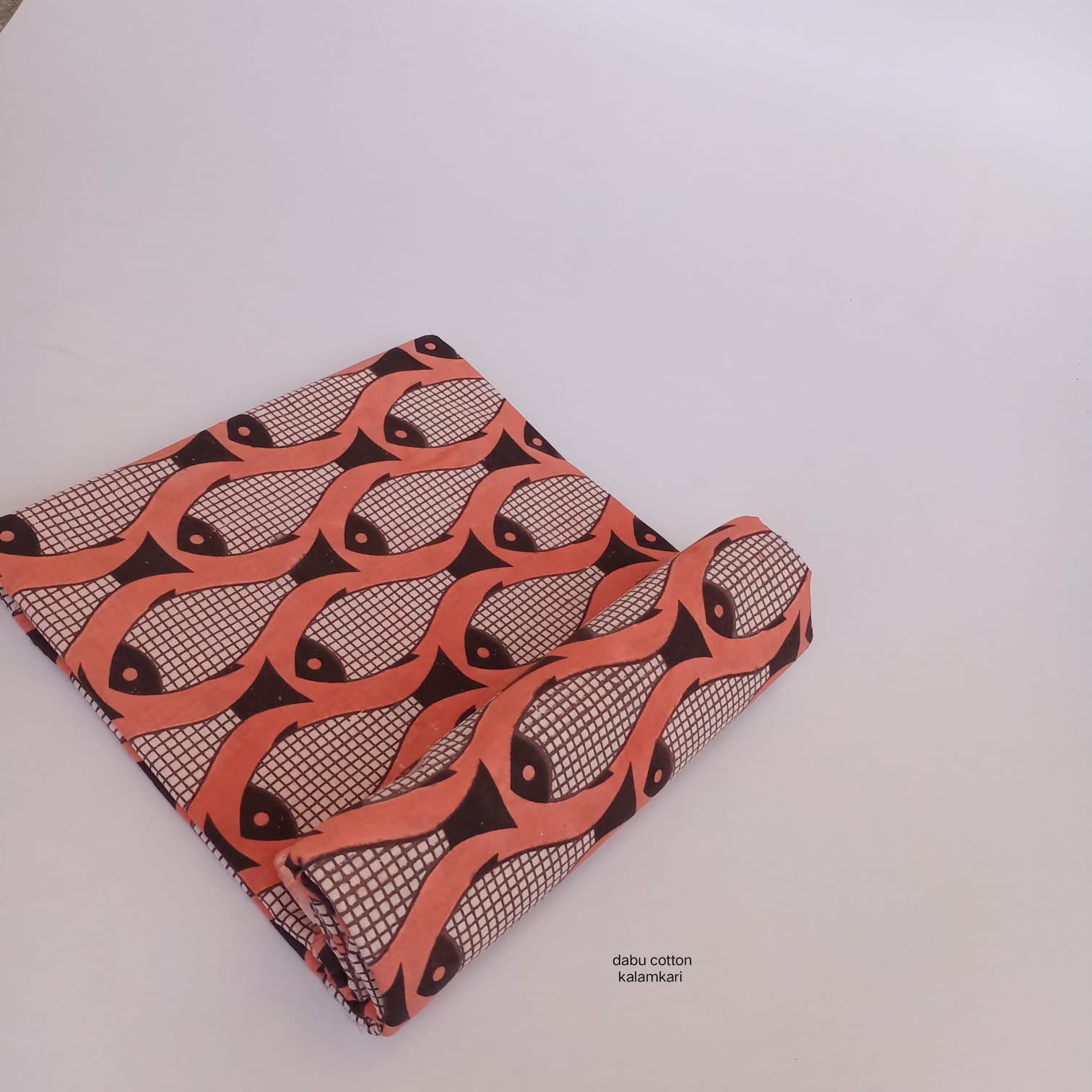 Orange fish print Dabu handblock cotton fabric, artisan-crafted, B2B bulk orders MOQ 1 Thaan